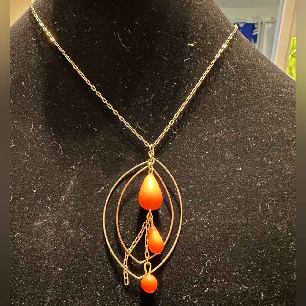 Necklace gold and salmon beads.
